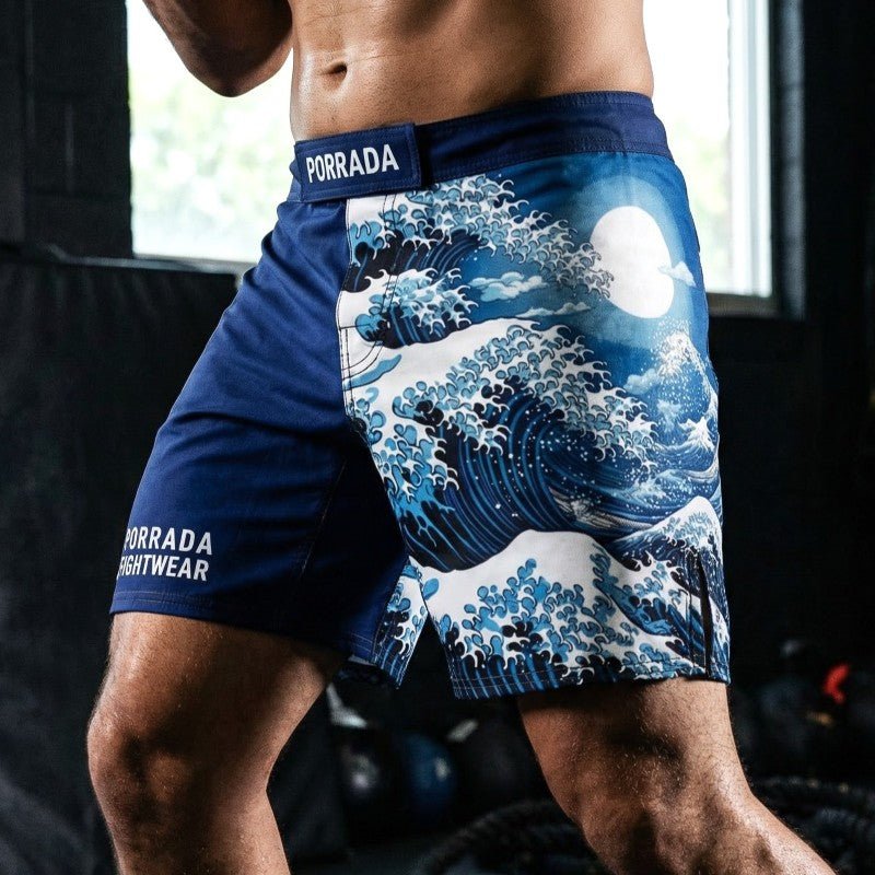 Male athlete wearing Porrada Fightwear BJJ and MMA fight shorts with wave design during training.