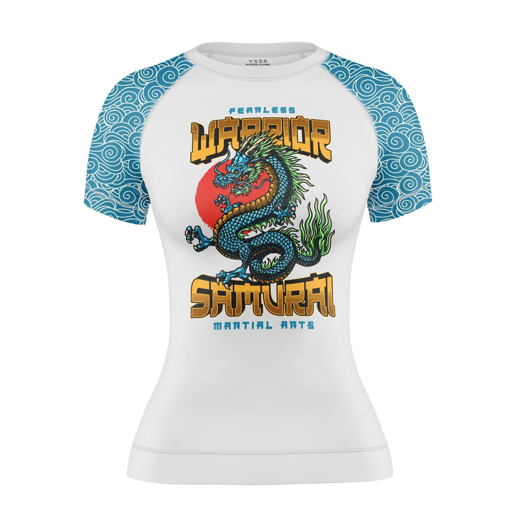 Women's rash guard with blue sleeves featuring a dragon graphic for BJJ and MMA