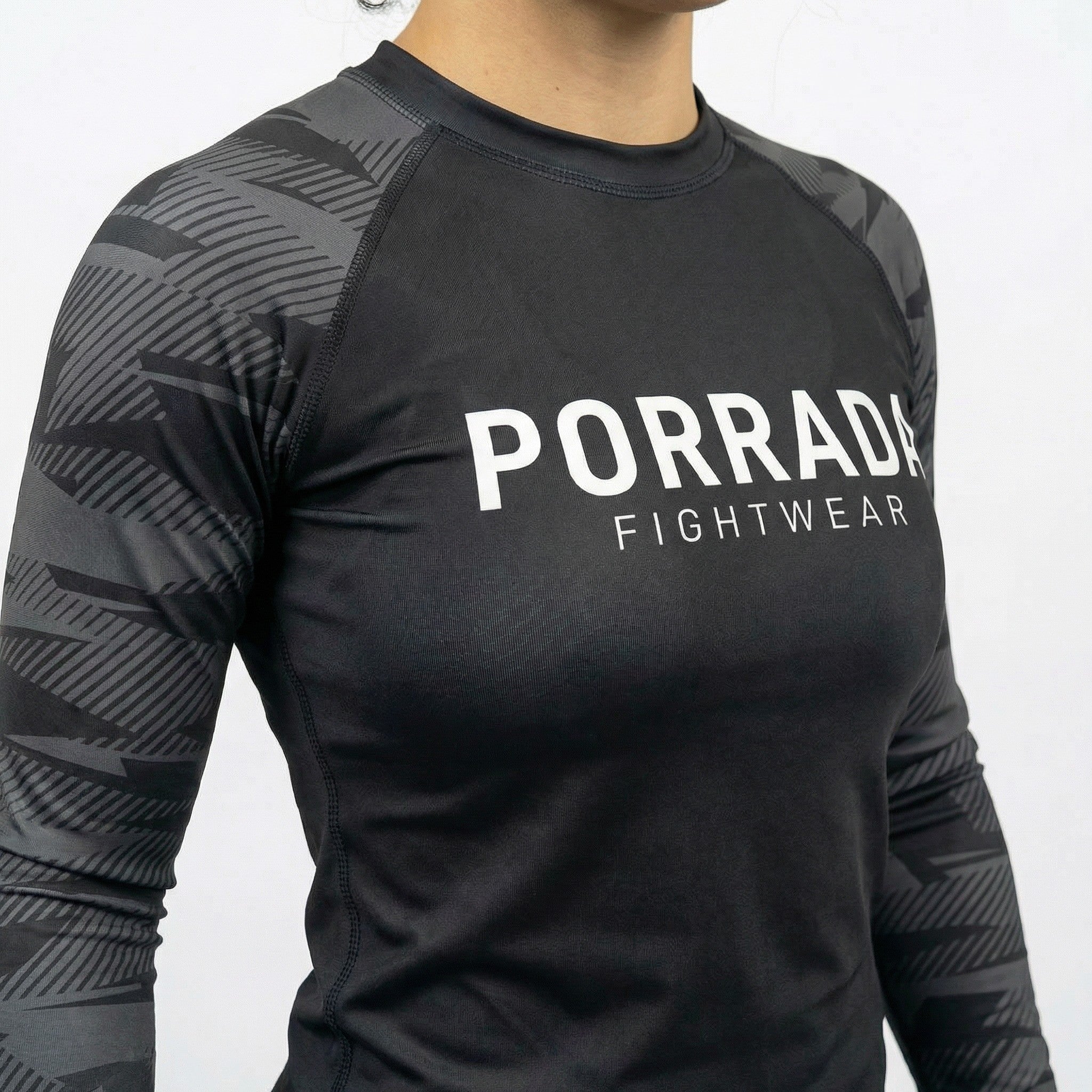 Black women's long-sleeve rash guard for BJJ and MMA