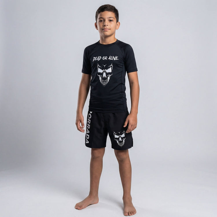 Kids’ black rash guard with short sleeves, featuring a skull design for martial arts and grappling