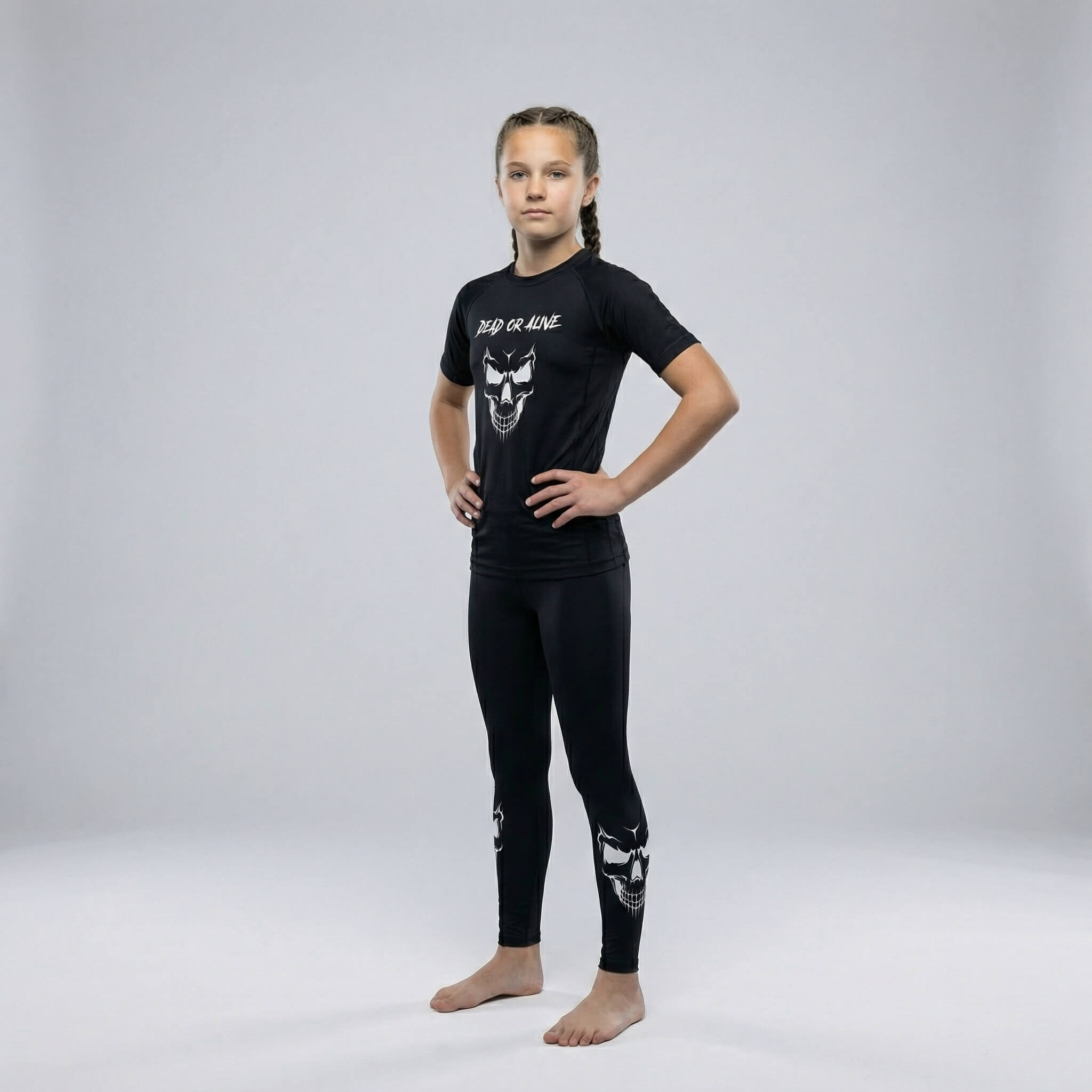 Children’s black spats with skull print, perfect for BJJ, MMA, and grappling