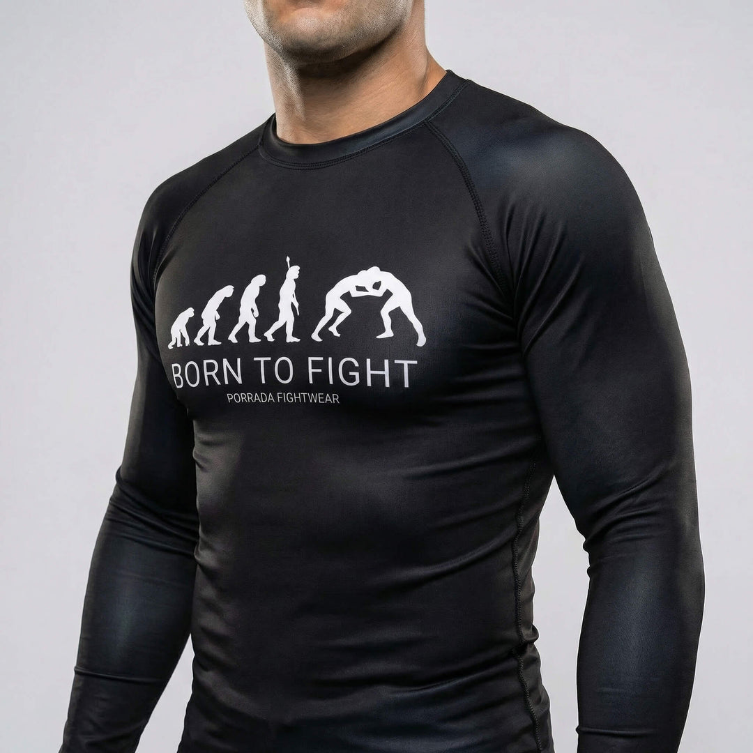 Black athletic long sleeve rash guard with ‘Born to Fight’ graphic, designed for BJJ and MMA training