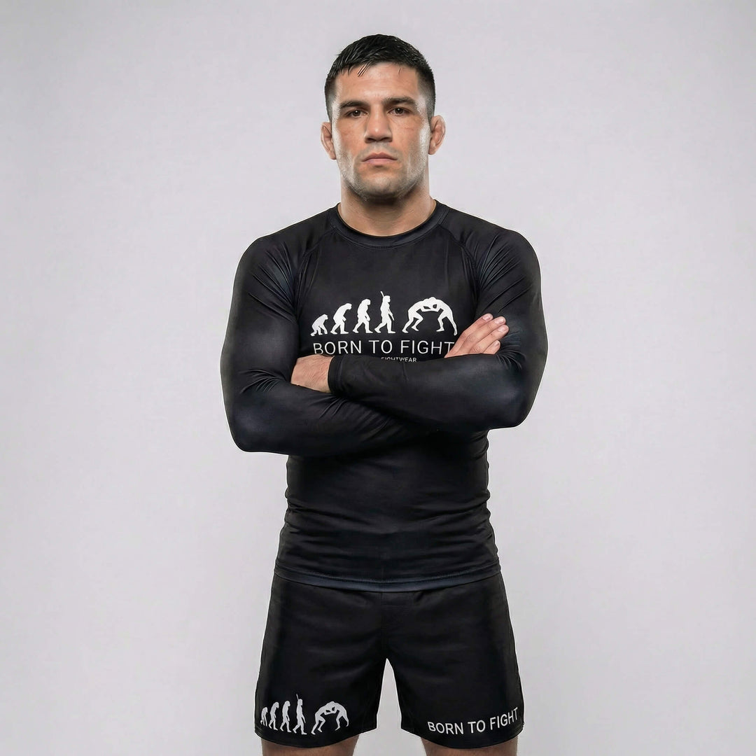 Athletic black long sleeve rash guard designed for BJJ and MMA featuring ‘Born to Fight’ print