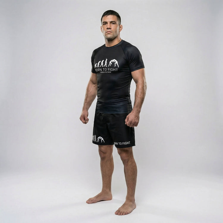 Athletic black short-sleeve rash guard with bold ‘Born to Fight’ graphic for BJJ and MMA