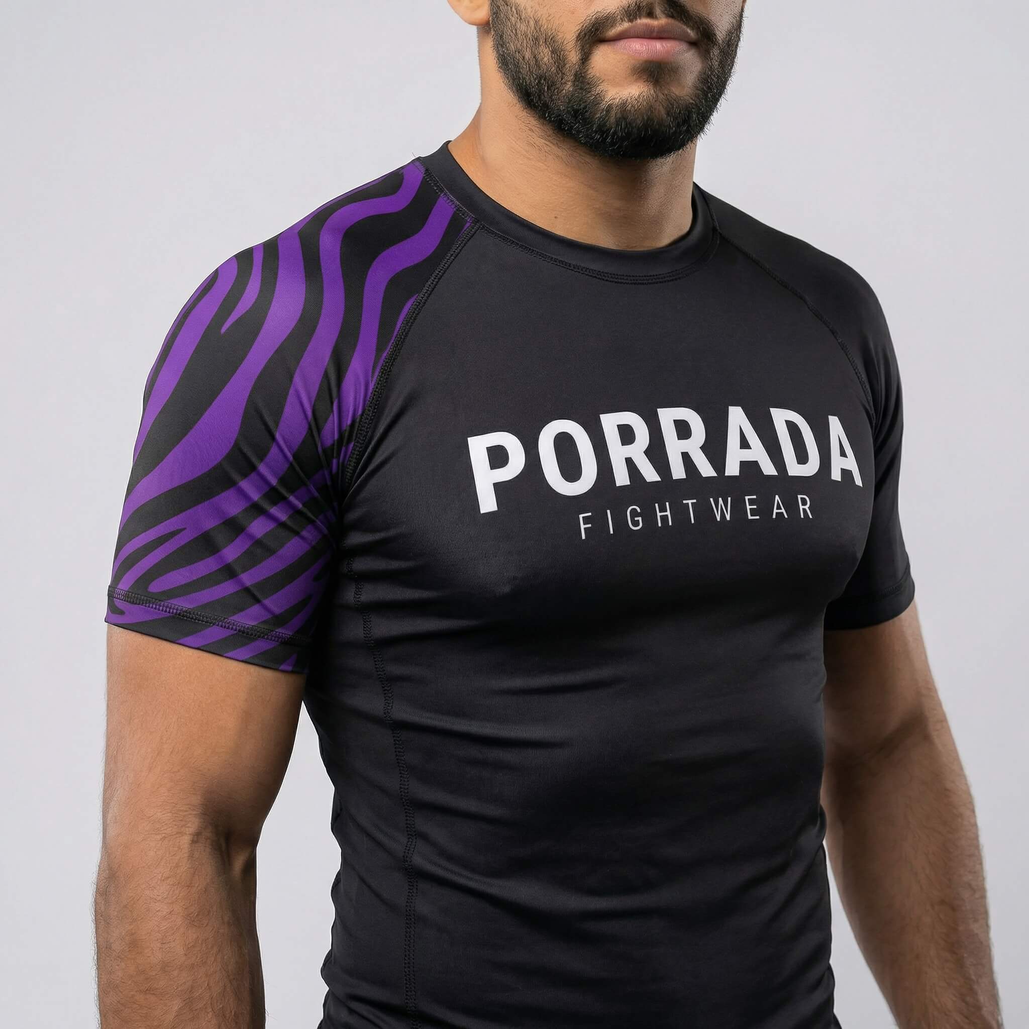 Closer view of IBJJF-approved purple short-sleeve rash guard
