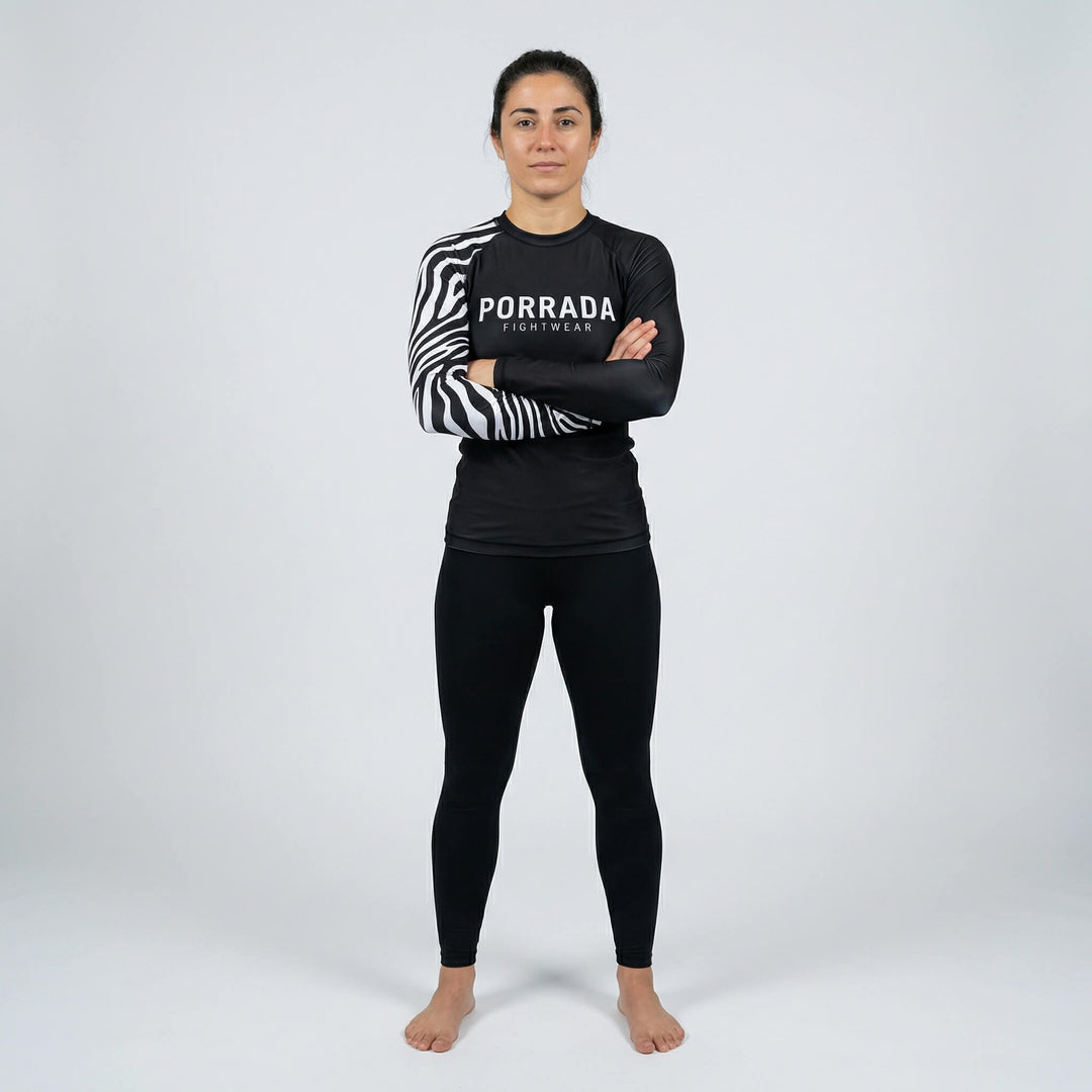 Female athlete white ranked BJJ competition rash guard
