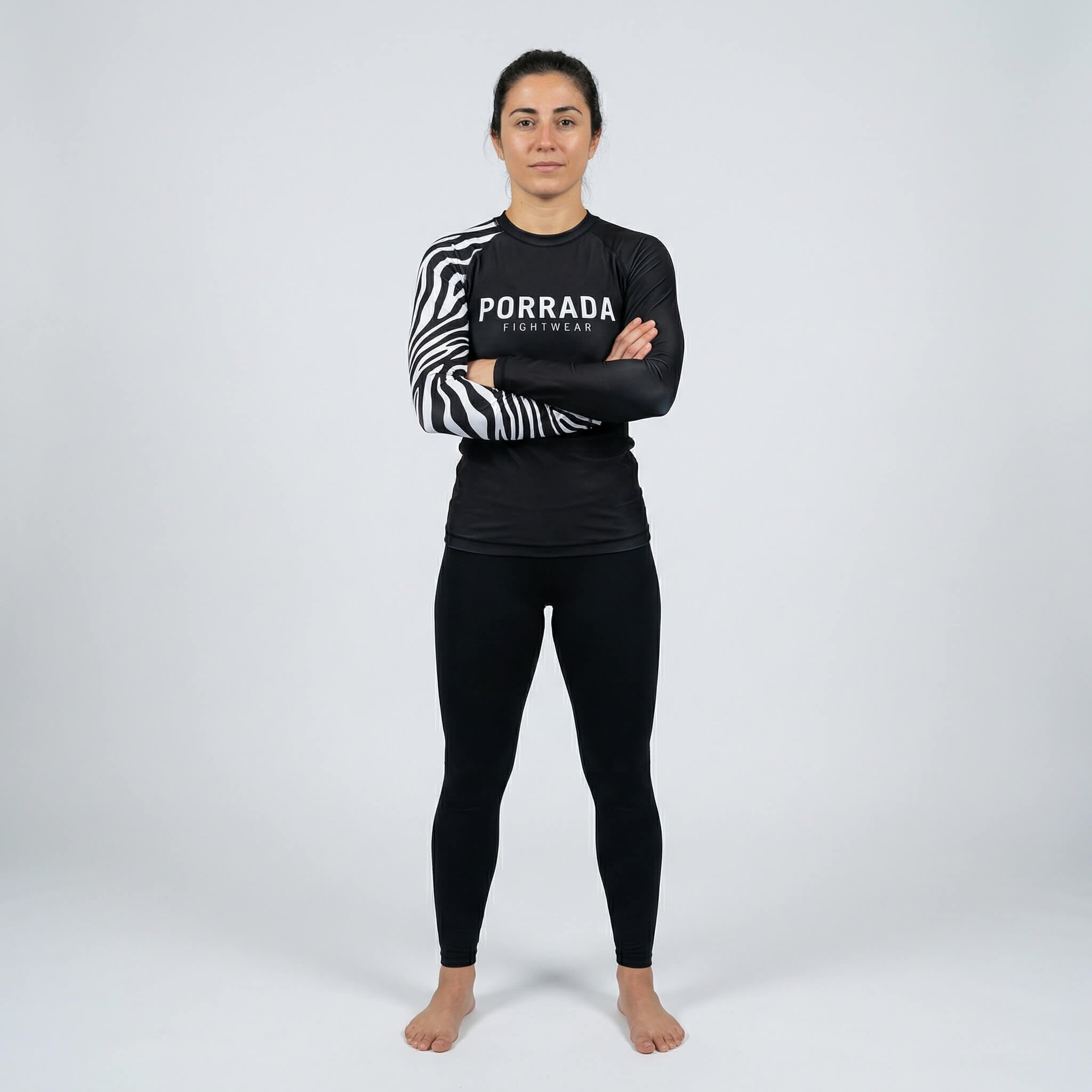 Female athlete white ranked BJJ competition rash guard