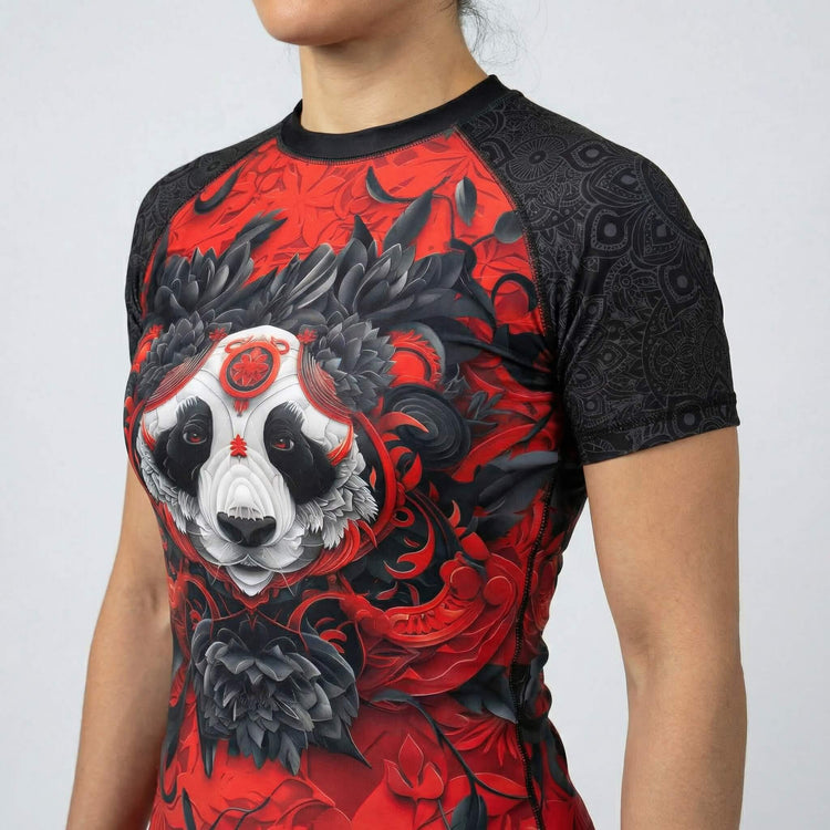 Close view of women’s Lotus Panda short sleeve rash guard